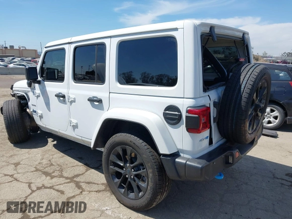 2024 Jeep Wrangler Sahara with VIN 1C4RJXP61RW126904, listed as a IAAI auction lot 41998215 with 32,034 mi miles and . Bid and sale history available at DreamBid. Image 3.