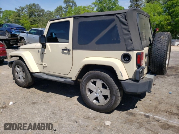 2011 Jeep Wrangler Sahara z VIN 1J4AA5D10BL528862, wystawiony jako Copart lot #53488515 z przebiegiem 198 865 mil mil oraz Szkoda całkowita • Salvage title. Historia ofert i sprzedaży dostępna na DreamBid. Obrazek 2.