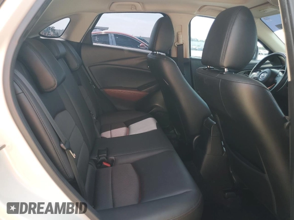 2017 Mazda CX-3 Touring z VIN JM1DKDC75H0168823, wystawiony jako Copart lot #57968955 z przebiegiem 116 231 mil mil oraz Szkoda całkowita • Salvage title. Historia ofert i sprzedaży dostępna na DreamBid. Obrazek 11.