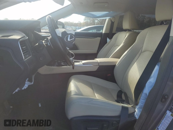 2021 Lexus RX with VIN 2T2AZMDA7MC275120, listed as a Copart auction lot 80251094 with 8,595 mi miles and Salvage Title. Bid and sale history available at carsss.com. Image 7.