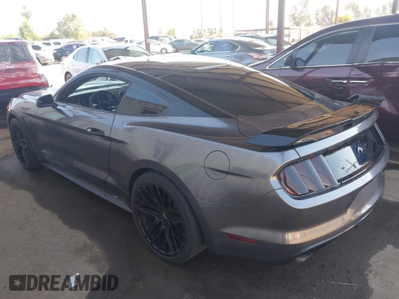 2017 Ford Mustang EcoBoost z VIN 1FA6P8TH9H5215435, wystawiony jako IAAI lot #42531715 z przebiegiem 81 730 mil mil oraz . Historia ofert i sprzedaży dostępna na DreamBid. Obrazek 3.