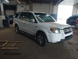 2007 Honda Pilot EX with VIN 2HKYF18417H540954, listed as a IAAI auction lot 41982047 with 223,699 mi miles. Bid and sale history available at carsss.com. Image 1.