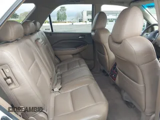 2004 Acura MDX Touring Pkg w/Navigation with VIN 2HNYD18834H520180, listed as a IAAI auction lot 41934124 with 201,817 mi miles. Bid and sale history available at carsss.com. Image 8.