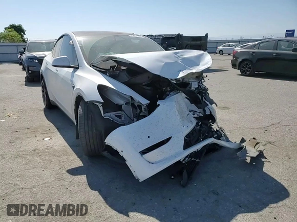 2022 Tesla Model Y Performance with VIN 7SAYGDEF9NF392197, listed as a Copart auction lot 57259105 with 43,400 mi miles and Salvage title. Bid and sale history available at DreamBid. Image 13.
