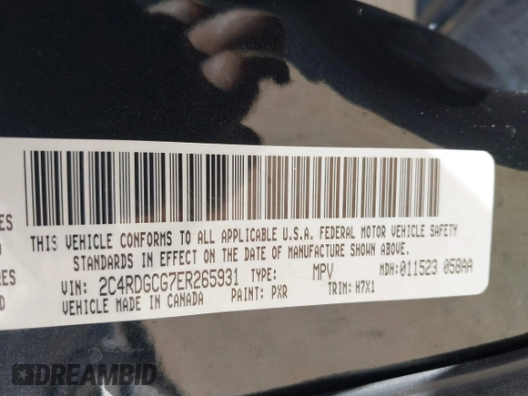 2014 Dodge Grand Caravan SXT with VIN 2C4RDGCG7ER265931, listed as a IAAI auction lot 42141644 with 205,968 mi miles and . Bid and sale history available at DreamBid. Image 9.