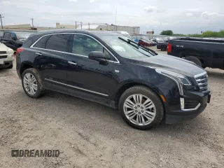 2019 Cadillac XT5 Premium Luxury FWD with VIN 1GYKNERS2KZ235309, listed as a Copart auction lot 54136495 with 133,964 mi miles and Salvage title. Bid and sale history available at DreamBid. Image 4.