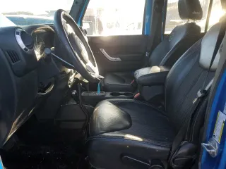 2015 Jeep Wrangler Unlimited Sport with VIN 1C4BJWDG1FL573349, listed as a Copart auction lot 86879394 with 96,773 mi miles and Salvage Title. Bid and sale history available at carsss.com. Image 7.