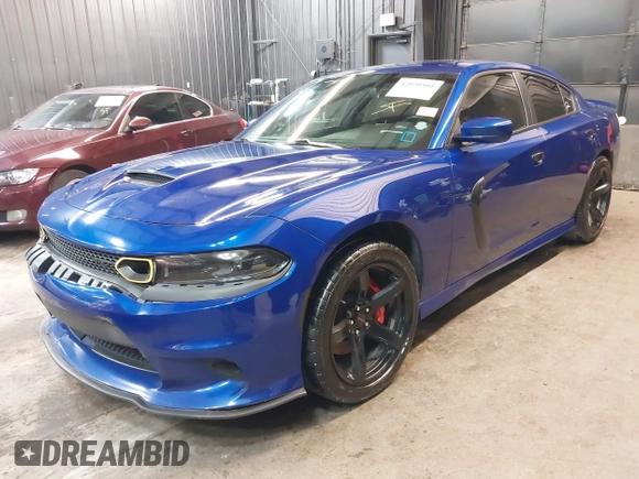 2022 Dodge Charger R/T with VIN 2C3CDXCT9NH127952, listed as a IAAI auction lot 42020401 with 55,483 mi miles and . Bid and sale history available at carsss.com. Image 22.