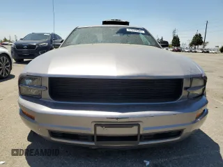 2007 Ford Mustang Deluxe with VIN 1ZVFT80N775319949, listed as a Copart auction lot 57623665 with 128,972 mi miles and Salvage title. Bid and sale history available at DreamBid. Image 5.