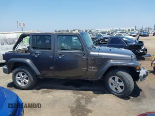 2016 Jeep Wrangler Unlimited Sahara with VIN 1C4HJWEG2GL273507, listed as a IAAI auction lot 39855004 with 87,011 mi miles and . Bid and sale history available at DreamBid. Image 13.