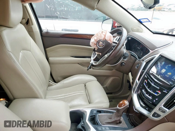 2014 Cadillac SRX Premium Collection with VIN 3GYFNGE39ES546393, listed as a Copart auction lot 57261145 with 84,258 mi miles and Salvage title. Bid and sale history available at DreamBid. Image 7.