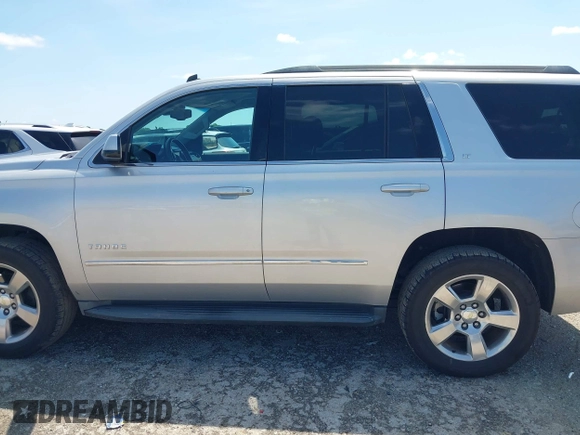 2015 Chevrolet Tahoe LT with VIN 1GNSCBKC9FR223426, listed as a IAAI auction lot 42352698 with 128,339 mi miles and . Bid and sale history available at DreamBid. Image 14.