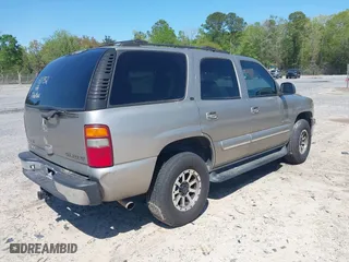 2001 Chevrolet Tahoe LS with VIN 1GNEK13T41R130752, listed as a IAAI auction lot 41966288 with 304,851 mi miles. Bid and sale history available at carsss.com. Image 4.