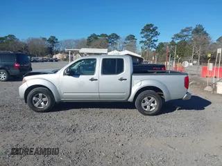 2013 Nissan Frontier SV with VIN 1N6AD0EV6DN720356, listed as a IAAI auction lot 41694570 with 243,279 mi miles and . Bid and sale history available at DreamBid. Image 14.