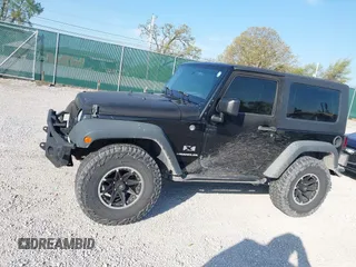 2008 Jeep Wrangler X with VIN 1J4FA24118L646979, listed as a IAAI auction lot 41981709 with 142,081 mi miles and . Bid and sale history available at DreamBid. Image 14.