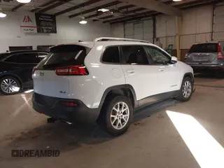 2017 Jeep Cherokee Latitude with VIN 1C4PJLCS7HW549570, listed as a IAAI auction lot 41276093 with 135,664 mi miles and . Bid and sale history available at carsss.com. Image 4.
