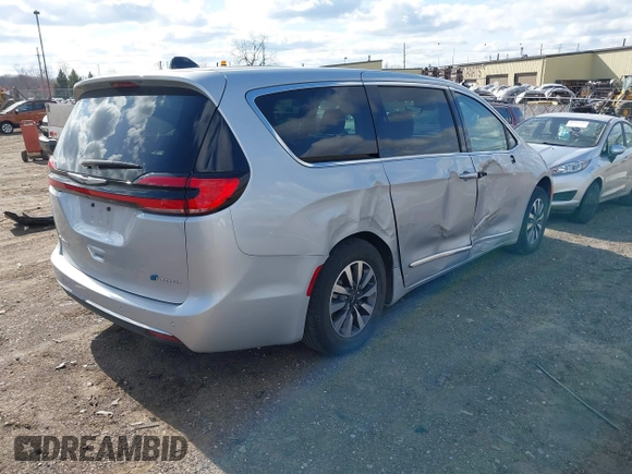2023 Chrysler Pacifica Hybrid Limited with VIN 2C4RC1S78PR551260, listed as a IAAI auction lot 41992752 with 55,136 mi miles and . Bid and sale history available at DreamBid. Image 4.
