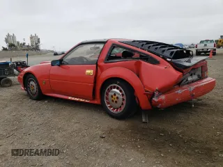 1984 Nissan 300ZX z VIN JN1CZ14SXEX009648, wystawiony jako Copart lot #56090024 z przebiegiem 48 776 mil mil oraz Szkody całkowita. Historia ofert i sprzedaży dostępna na DreamBid. Obrazek 2.