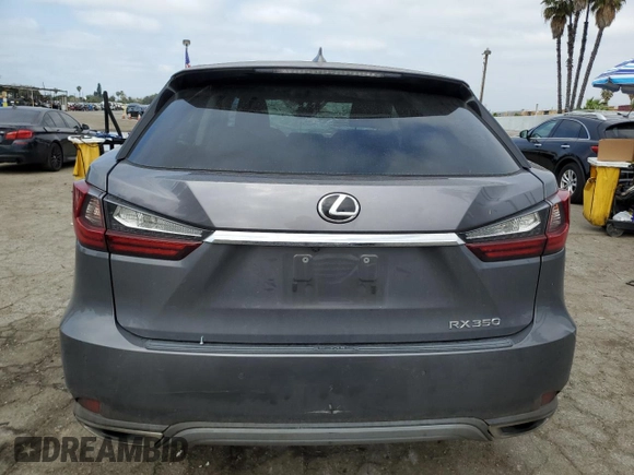 2020 Lexus RX 350 z VIN 2T2AZMAA0LC174391, wystawiony jako Copart lot #49818535 z przebiegiem 126 867 mil mil oraz Szkoda całkowita • Salvage title. Historia ofert i sprzedaży dostępna na DreamBid. Obrazek 6.