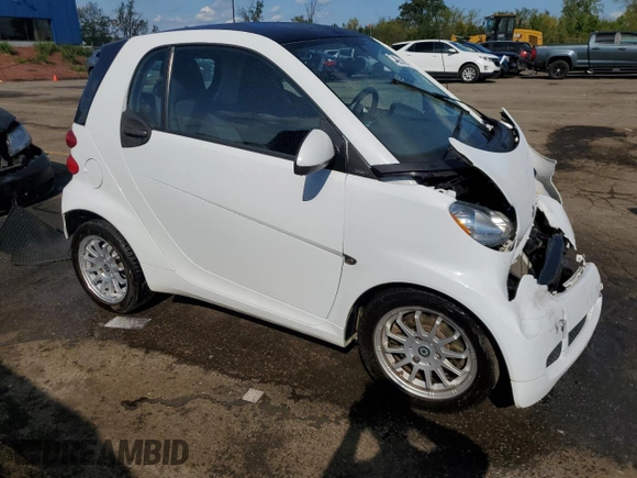 2011 Smart fortwo Pure with VIN WMEEJ3BA9BK474094, listed as a Copart auction lot 74012374 with 47,560 mi miles and Clean title. Bid and sale history available at DreamBid. Image 4.