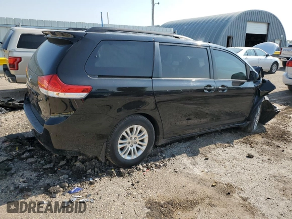 2012 Toyota Sienna XLE AAS with VIN 5TDYK3DC6CS211062, listed as a Copart auction lot 59404205 with Not provided miles and Salvage title. Bid and sale history available at DreamBid. Image 3.