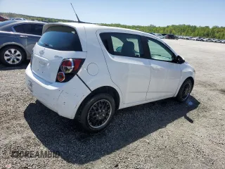 2013 Chevrolet Sonic LS with VIN 1G1JA6SH7D4120201, listed as a Copart auction lot 53231295 with 205,985 mi miles and Salvage title. Bid and sale history available at DreamBid. Image 3.
