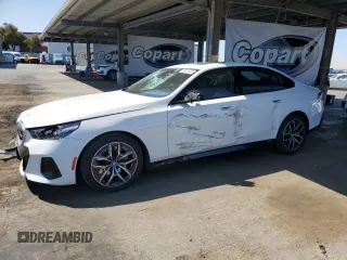 2024 BMW i5 M60 with VIN WBY43FK06RCP43426, listed as a Copart auction lot 58570225 with 8,387 mi miles and Salvage title. Bid and sale history available at DreamBid. Image 1.