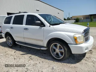 2004 Dodge Durango Limited with VIN 1D4HD58D64F193000, listed as a Copart auction lot 56909285 with 206,493 mi miles and Clean title. Bid and sale history available at DreamBid. Image 4.