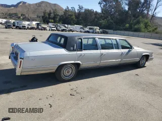 1992 Cadillac Brougham z VIN 1G6DW5474NR713140, wystawiony jako Copart lot #76990784 z przebiegiem 63 153 mil mil oraz Tytuł czysty. Historia ofert i sprzedaży dostępna na DreamBid. Obrazek 3.