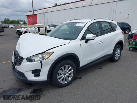 2016 Mazda CX-5 Sport with VIN JM3KE4BY7G0764563, listed as a IAAI auction lot 42279993 with 128,950 mi miles and . Bid and sale history available at DreamBid. Image 18.