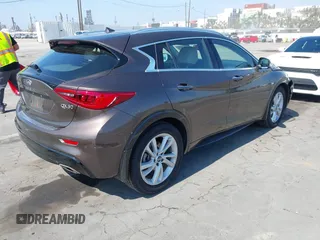 2018 Infiniti QX30 Premium with VIN SJKCH5CP5JA054091, listed as a IAAI auction lot 42471932 with 28,713 mi miles and . Bid and sale history available at DreamBid. Image 4.