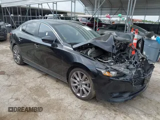 2021 Mazda 3 Select z VIN JM1BPABL0M1320646, wystawiony jako IAAI lot #42110404 z przebiegiem 79 931 mil mil oraz . Historia ofert i sprzedaży dostępna na DreamBid. Obrazek 1.