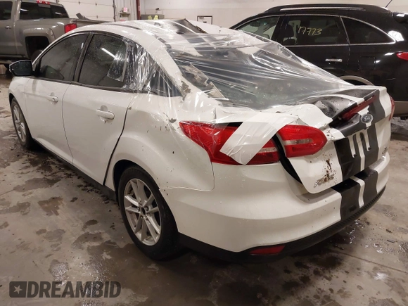 2015 Ford Focus SE with VIN 1FADP3F26FL253926, listed as a IAAI auction lot 41947476 with 86,254 mi miles and . Bid and sale history available at carsss.com. Image 3.