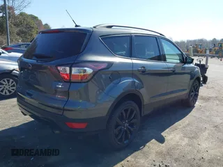 2017 Ford Escape SE with VIN 1FMCU9GD9HUC84906, listed as a IAAI auction lot 41762989 with 147,721 mi miles. Bid and sale history available at carsss.com. Image 4.