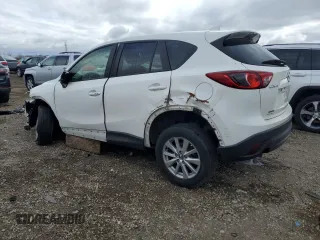 2015 Mazda CX-5 Touring with VIN JM3KE2CY2F0541400, listed as a Copart auction lot 52971015 with 131,569 mi miles and Clean Title. Bid and sale history available at carsss.com. Image 2.
