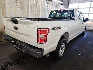2019 Ford F-150 XL with VIN 1FTEX1E55KKC02870, listed as a IAAI auction lot 42631387 with 206,967 mi miles and . Bid and sale history available at DreamBid. Image 26.
