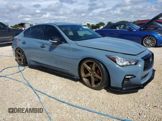 2021 Infiniti Q50 Red Sport 400 with VIN JN1FV7DP2MM850371, listed as a Copart auction lot 73762964 with 49,874 mi miles and Salvage Title. Bid and sale history available at DreamBid. Image 4.