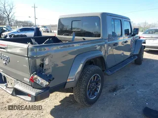 2021 Jeep Gladiator Overland with VIN 1C6HJTFG0ML507773, listed as a IAAI auction lot 41617970 with 95,816 mi miles and . Bid and sale history available at DreamBid. Image 4.
