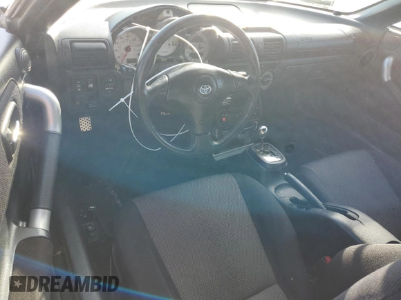 2002 Toyota MR2 z VIN JTDFR320620048426, wystawiony jako Copart lot #88367235 z przebiegiem 98 380 mil mil oraz Szkoda całkowita • Salvage title. Historia ofert i sprzedaży dostępna na DreamBid. Obrazek 8.