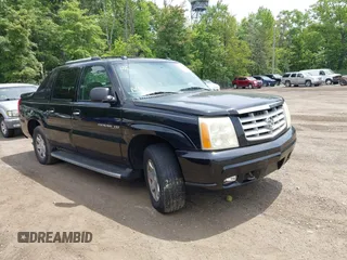 2004 Cadillac Escalade EXT z VIN 3GYEK62N54G290873, wystawiony jako IAAI lot #42411835 z przebiegiem 223 898 mil mil oraz . Historia ofert i sprzedaży dostępna na DreamBid. Obrazek 1.