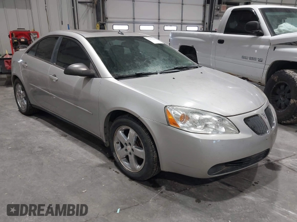 2005 Pontiac G6 GT with VIN 1G2ZH528854167162, listed as a IAAI auction lot 40973635 with 207,742 mi miles. Bid and sale history available at carsss.com. Image 1.
