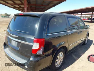 2014 Chrysler Town & Country Touring with VIN 2C4RC1BG4ER242768, listed as a IAAI auction lot 41683104 with 229,954 mi miles and . Bid and sale history available at DreamBid. Image 4.