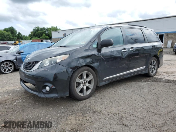 2014 Toyota Sienna SE with VIN 5TDXK3DC7ES425945, listed as a Copart auction lot 63067955 with 173,815 mi miles and Salvage title. Bid and sale history available at DreamBid. Image 1.