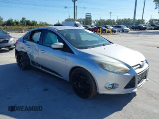 2012 Ford Focus SE with VIN 1FAHP3F23CL265724, listed as a IAAI auction lot 41184121 with 216,873 mi miles. Bid and sale history available at carsss.com. Image 1.