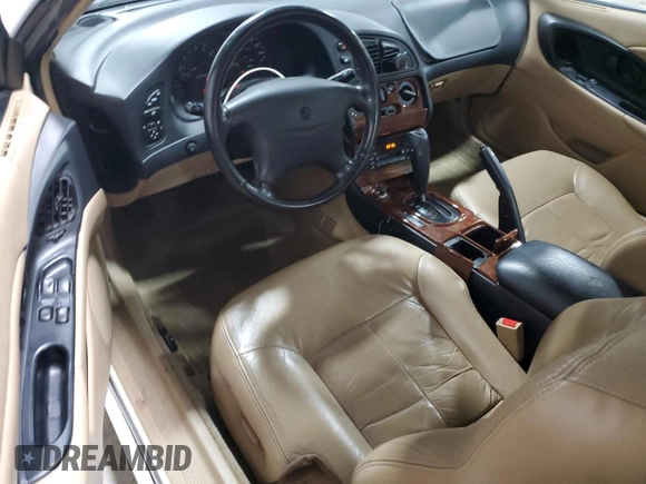 1998 Chrysler Sebring LXi z VIN 4C3AU52N6WE127896, wystawiony jako Copart lot #80051754 z przebiegiem 71 034 mil mil oraz Szkoda całkowita • Salvage title. Historia ofert i sprzedaży dostępna na DreamBid. Obrazek 8.