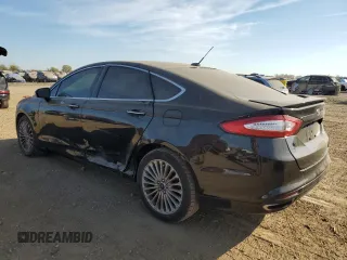 2016 Ford Fusion Titanium with VIN 3FA6P0K98GR319289, listed as a Copart auction lot 77114294 with 123,586 mi miles and Salvage Title. Bid and sale history available at DreamBid. Image 2.
