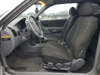 2004 Hyundai Accent GL with VIN KMHCG35C34U279368, listed as a Copart auction lot 50233625 with 104,086 mi miles and Clean Title. Bid and sale history available at carsss.com. Image 7.