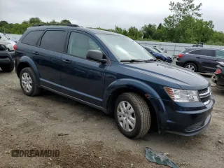 2014 Dodge Journey SE with VIN 3C4PDCAB2ET174067, listed as a Copart auction lot 60966025 with 189,091 mi miles and Clean title. Bid and sale history available at DreamBid. Image 4.