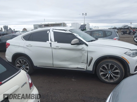 2015 BMW X6 xDrive35i with VIN 5UXKU2C57F0N77194, listed as a IAAI auction lot 41818860 with 105,579 mi miles and . Bid and sale history available at DreamBid. Image 13.
