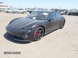 2022 Porsche Taycan GTS z VIN WP0AD2Y12NSA59275, wystawiony jako IAAI lot #42170547 z przebiegiem 43 757 mil mil oraz . Historia ofert i sprzedaży dostępna na DreamBid. Obrazek 19.